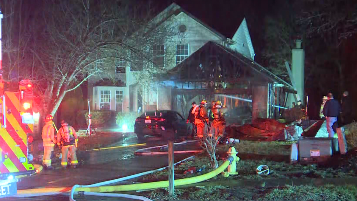 Crews battle early morning garage fire in Alexandria