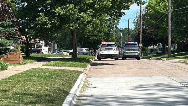 police at the scene of a standoff at a residence in des moines