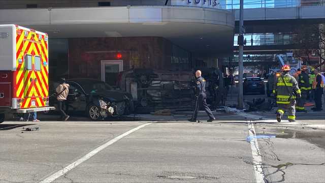 Des Moines' R&T Lofts building blocked by car after rollover crash