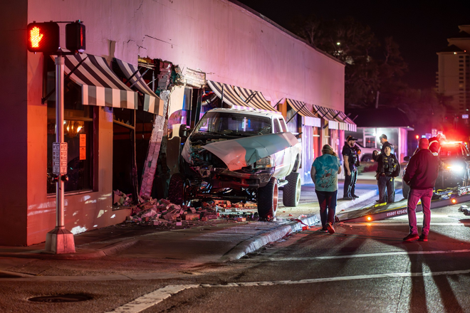 Truck crashes into building in Fort Myers