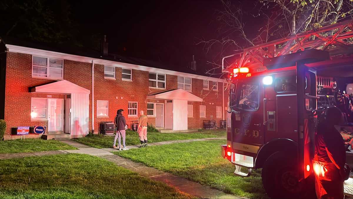 2 rescued from roof, taken to hospital after fire breaks out