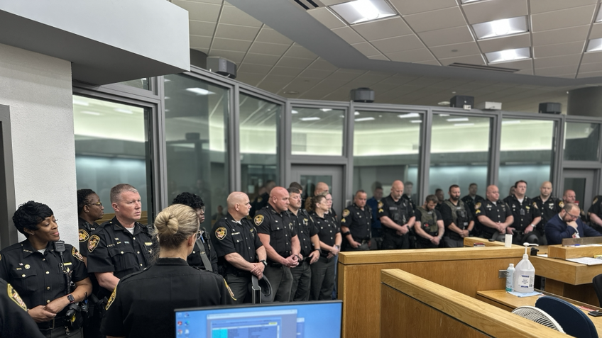 PHOTOS: Officers pack courtroom at arraignment of man accused of ...