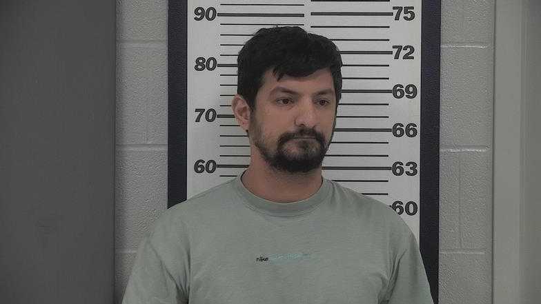 Man charged in murder of Kansas City area newspaper reporter