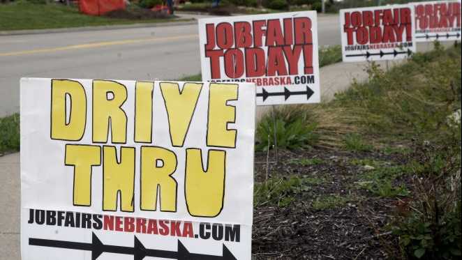 in this wednesday, may 6, 2020, photo, signs point to a drive thru job fair in omaha, neb ap photonati harnik