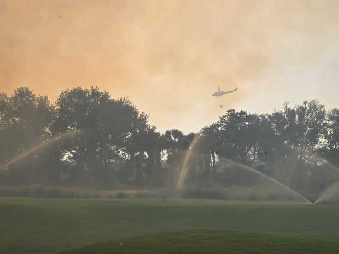 Brush fire near The Club at Mediterra