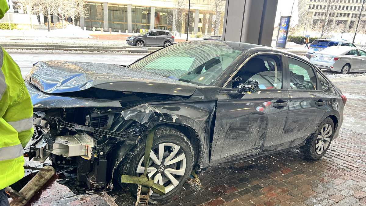 Driver hospitalized after car crashed into Boston salon, police say