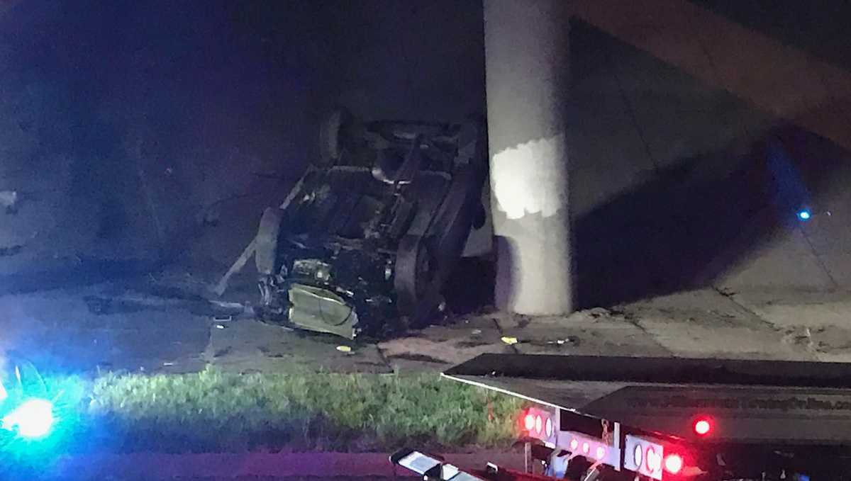 Car lands on top in Ronald Reagan Highway crash