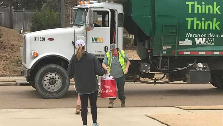 Bramlett family gifts garbage crew with gifts every year.