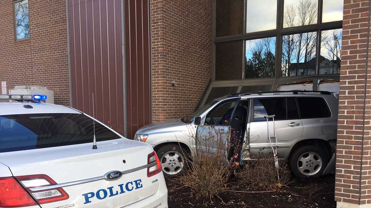 Images Vehicle crashes into Laconia building