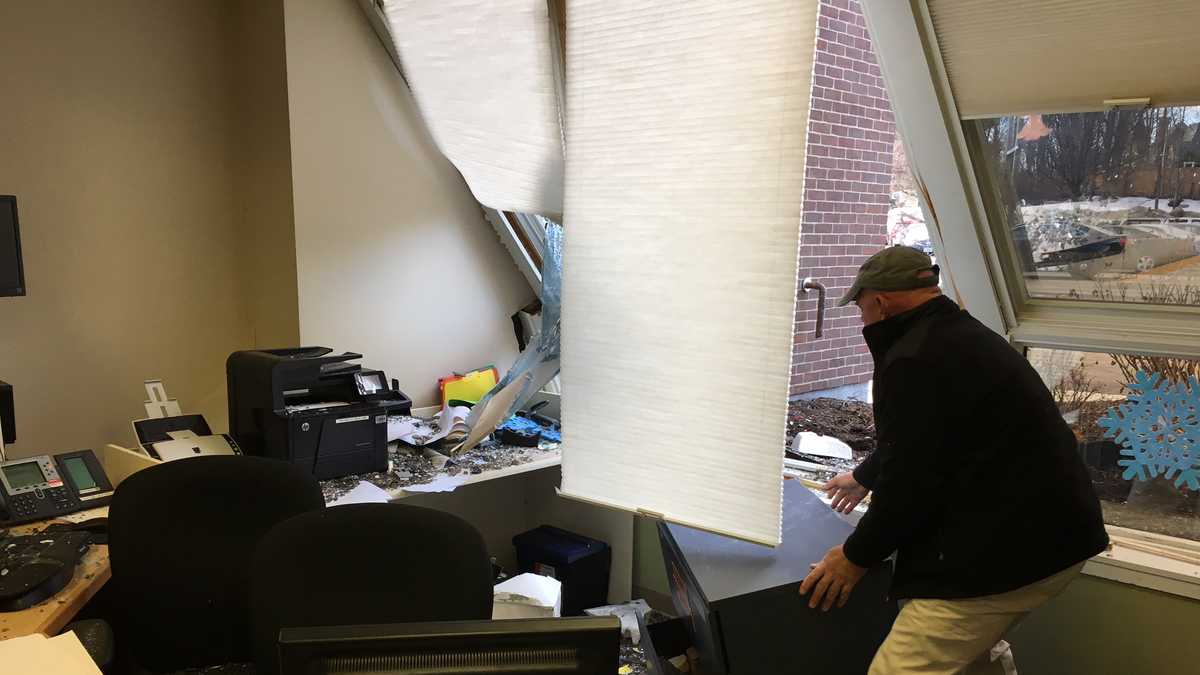 Images Vehicle crashes into Laconia building