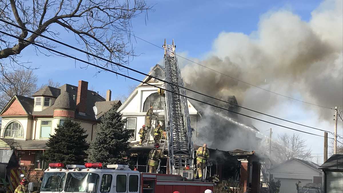 Omaha firefighters battle house fire Friday afternoon