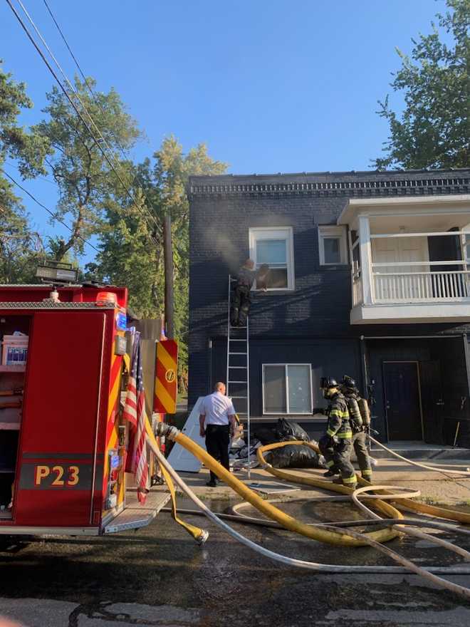 Kansas City fire crews rescue 4 people and 2 dogs from fire