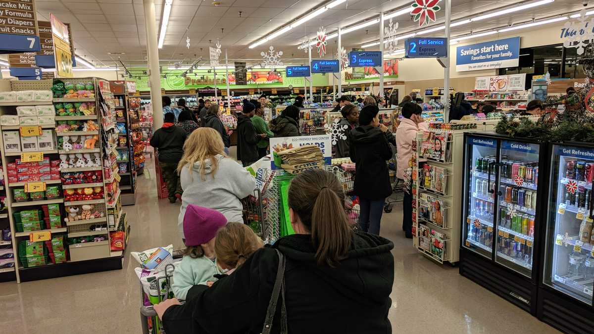 Crowds rush to grocery stores for muchneeded essentials as winter