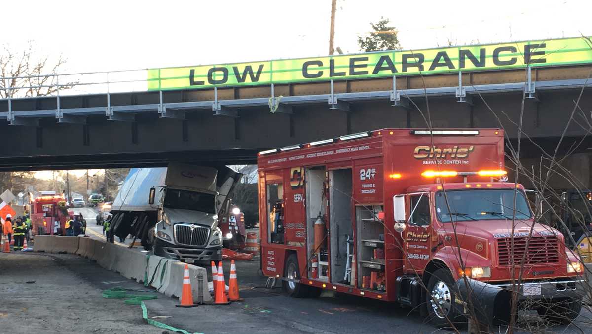 Despite new clearance, another truck gets trapped under notorious bridge