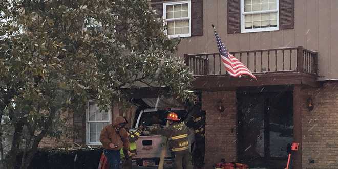 Duquesne Light truck crashes into home in Churchill