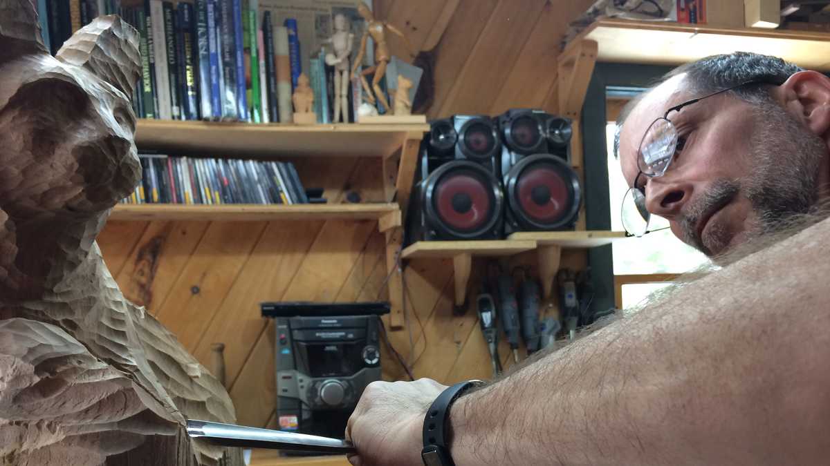 Photos Maine sculptor turns wood into works of art