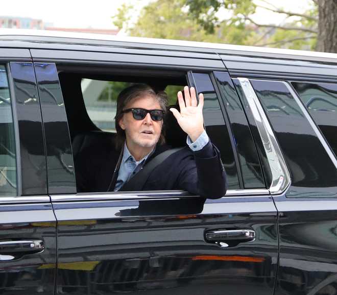 Paul&#x20;McCartney&#x20;waves&#x20;at&#x20;fans&#x20;as&#x20;he&#x20;arrives&#x20;for&#x20;sound&#x20;check&#x20;Oct.&#x20;14,&#x20;2025,&#x20;at&#x20;Casey&#x27;s&#x20;Center&#x20;in&#x20;Des&#x20;Moines.