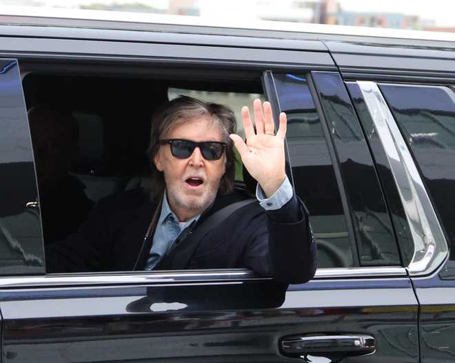 Paul&#x20;McCartney&#x20;waves&#x20;at&#x20;fans&#x20;as&#x20;he&#x20;arrives&#x20;for&#x20;sound&#x20;check&#x20;Oct.&#x20;14,&#x20;2025,&#x20;at&#x20;Casey&#x27;s&#x20;Center&#x20;in&#x20;Des&#x20;Moines.