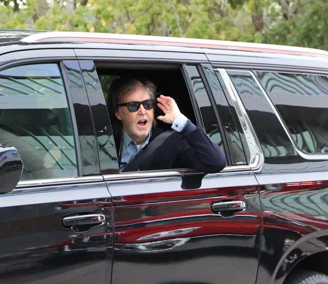 Paul&#x20;McCartney&#x20;greets&#x20;fans&#x20;as&#x20;he&#x20;arrives&#x20;for&#x20;sound&#x20;check&#x20;Oct.&#x20;14,&#x20;2025,&#x20;at&#x20;Casey&#x27;s&#x20;Center&#x20;in&#x20;Des&#x20;Moines.