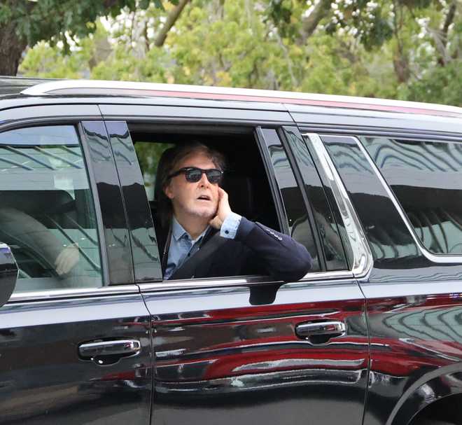 Paul&#x20;McCartney&#x20;listens&#x20;to&#x20;fans&#x27;&#x20;cheers&#x20;as&#x20;he&#x20;arrives&#x20;for&#x20;sound&#x20;check&#x20;Oct.&#x20;14,&#x20;2025,&#x20;at&#x20;Casey&#x27;s&#x20;Center&#x20;in&#x20;Des&#x20;Moines.