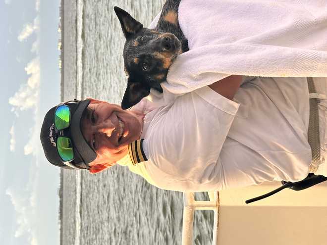 boat captain helps rescue dog off the gulf of mexico