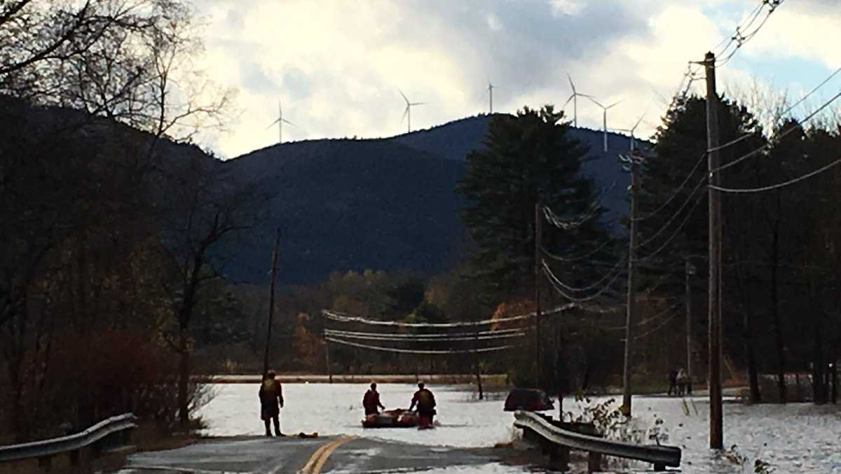 2 adults, 1 child rescued from vehicle on flooded road in Plymouth