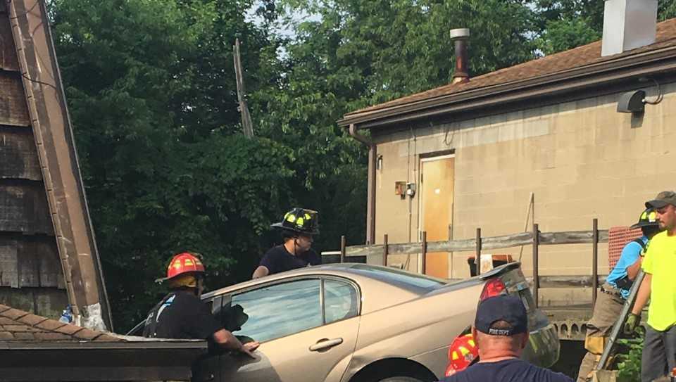 Car crashes through house in Braddock Hills