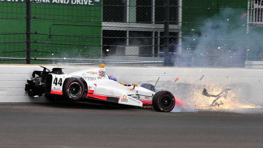 The car driven by Buddy Lazier hits the wall in the second turn during the running of the Indianapolis 500 auto race at Indianapolis Motor Speedway, Sunday, May 28, 2017, in Indianapolis. (AP Photo/John Maxwell) The car driven by Buddy Lazier hits the wall in the second turn during the running of the Indianapolis 500 auto race at Indianapolis Motor Speedway, Sunday, May 28, 2017, in Indianapolis. (AP Photo/John Maxwell)