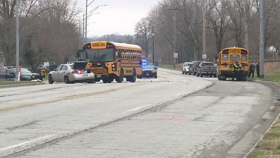 1 critically hurt after car, 2 Independence school buses collide