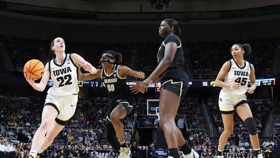 ALBANY, NEW YORK - MARCH 30: Caitlin Clark #22 of the Iowa Hawkeyes drives against Jaylyn Sherrod #0 of the Colorado Buffaloes during the second half in the Sweet 16 round of the NCAA Women&apos;s Basketball Tournament at MVP Arena on March 30, 2024 in Albany, New York.
