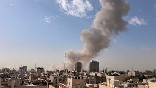 Smoke rises on the skyline after an explosion in Tehran, Iran, Saturday, Feb. 28, 2026.