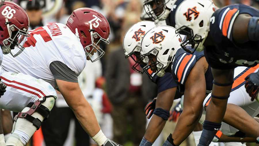 Football players lined up before the snap