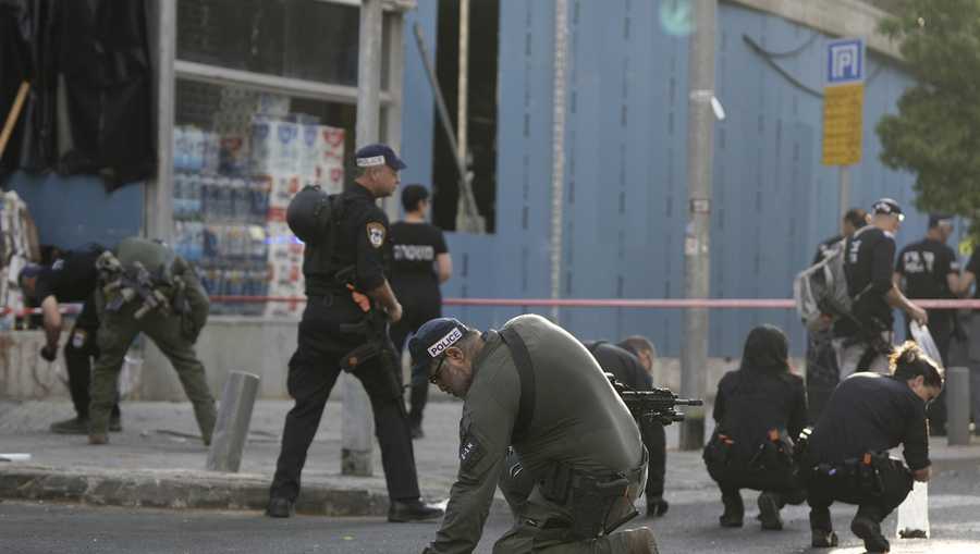 Israeli police investigate the scene of a deadly explosion in Tel Aviv, Israel, Friday, July 19, 2024.