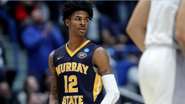 Hajjy & Sons - DRAFT OUTFIT - #2 OVERALL JA MORANT from @murraystateuniv  university wearing a classic yet modern Purple with White PIN STRIPE SUIT  for @nba Draft Day 2019 . The