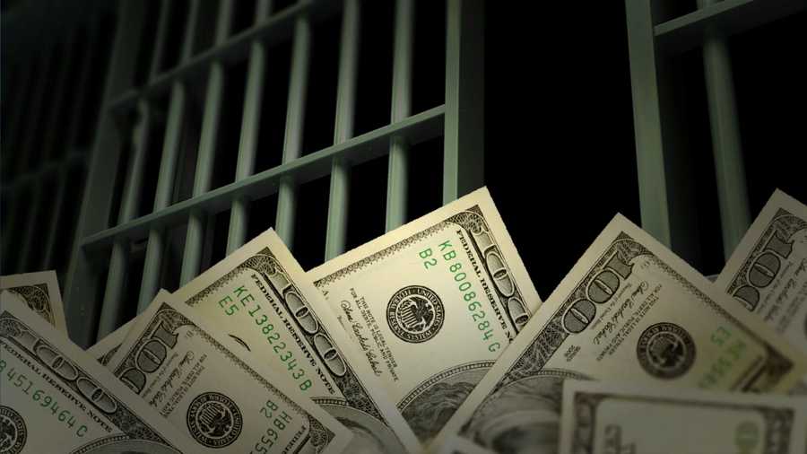 Cash in front of a jail cell