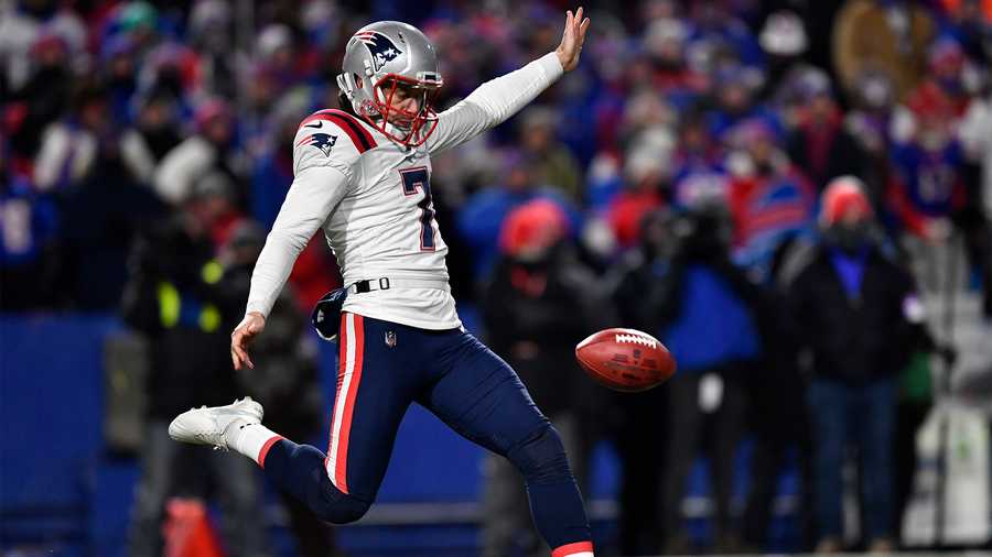 New England Patriots punter Jake Bailey (7) kicks the ball during the first half of an NFL wild-card playoff football game against the Buffalo Bills, Saturday, Jan. 15, 2022, in Orchard Park, N.Y.