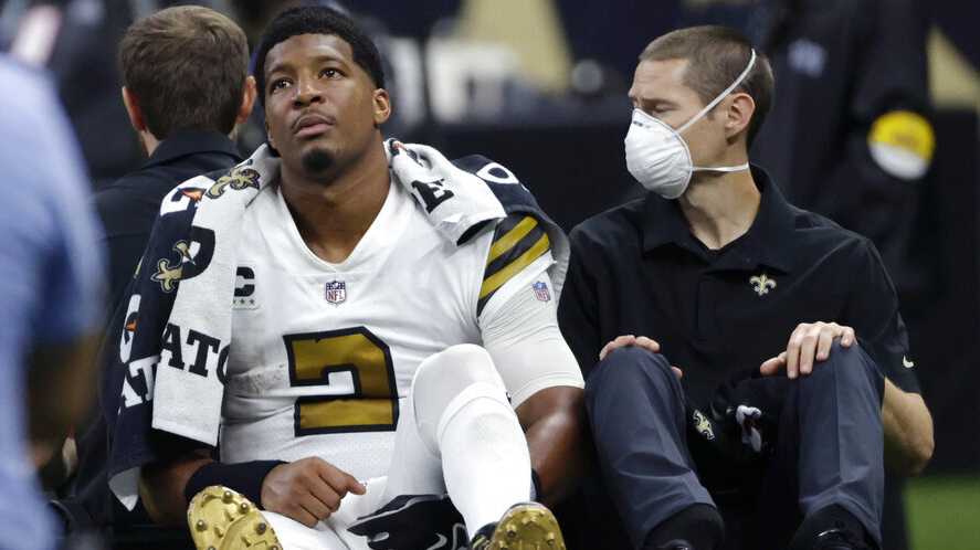 New Orleans Saints quarterback Jameis Winston (2) is carted off the field after being injured from a horse-collar tackle in the first half of an NFL football game against the Tampa Bay Buccaneers in New Orleans, Sunday, Oct. 31, 2021.