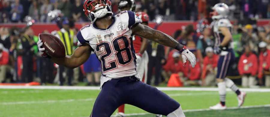 New England Patriots' James White celebrates after scoring a touchdown during the second half of the NFL Super Bowl 51 football game against the Atlanta Falcons, Sunday, Feb. 5, 2017, in Houston.