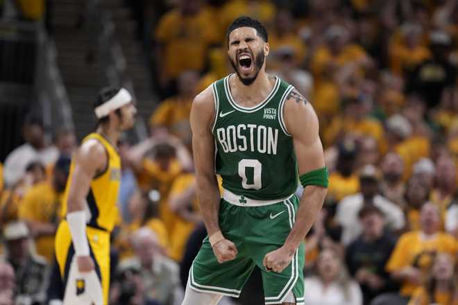 Boston Celtics forward Jayson Tatum celebrates with zero points during the second half of Game 3 of the NBA Eastern Conference Basketball Finals against the Indiana Pacers, Saturday, May 25, 2024, in Indianapolis. Photo by Michael Conroy, Associated Press