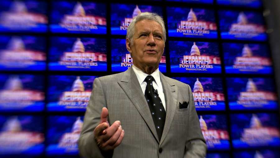 Alex Trebek poses on the set of his game show Jeopardy on April 21, 2012. Mr. Trebek was in Washington for his 'Jeopardy! Power Players Week' shows which were being filmed inside DAR Constitution Hall. 