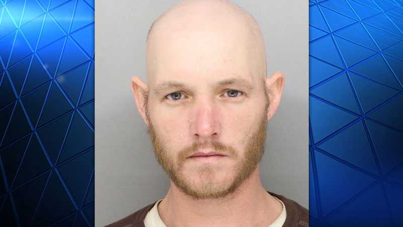 Man accused of stealing car with child inside arrested