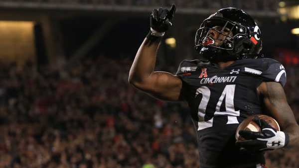 Cincinnati Bearcats running back Jerome Ford reacts after scoring a touchdown during the game against the Temple Owls and the Cincinnati Bearcats on October 8 at Nippert Stadium in Cincinnati.