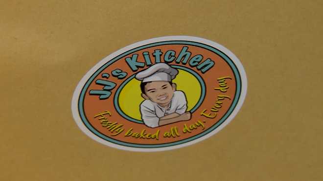 The&#x20;logo&#x20;for&#x20;JJ&#x27;s&#x20;Kitchen,&#x20;a&#x20;home&#x20;bakery&#x20;business&#x20;run&#x20;by&#x20;12-year-old&#x20;Jason&#x20;Chan,&#x20;of&#x20;Easton,&#x20;Massachusetts.&#x20;Chan&#x20;is&#x20;the&#x20;first&#x20;contestant&#x20;from&#x20;Massachusetts&#x20;to&#x20;appear&#x20;on&#x20;&quot;Kids&#x20;Baking&#x20;Championship.&quot;&#x20;He&#x20;will&#x20;be&#x20;featured&#x20;on&#x20;the&#x20;Food&#x20;Network&#x20;show&#x27;s&#x20;11th&#x20;season,&#x20;which&#x20;premieres&#x20;on&#x20;Dec.&#x20;26,&#x20;2022.