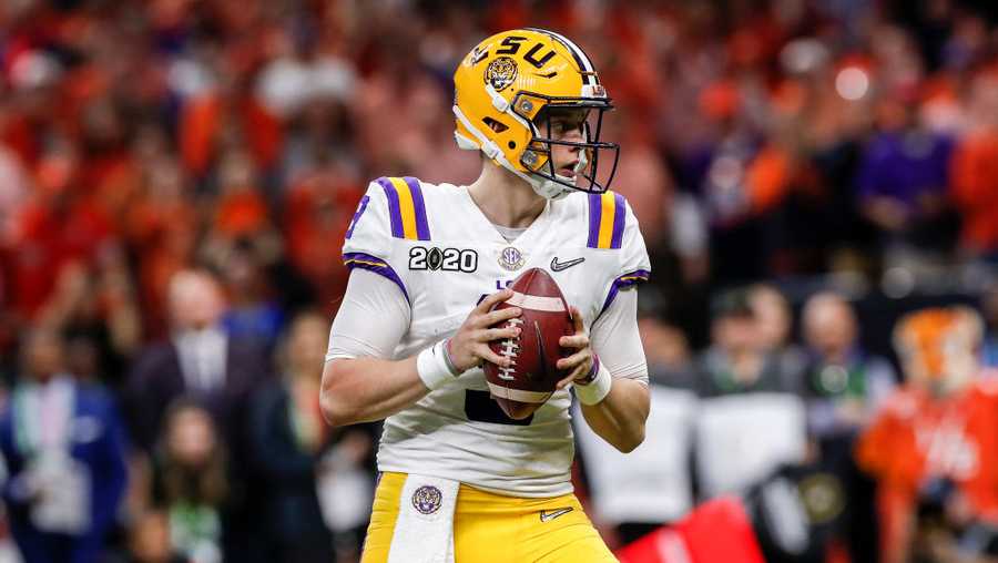 Quarterback Joe Burrow #9 of the LSU Tigers is shown on a pass play during the College Football Playoff National Championship game against the Clemson Tigers at the Mercedes-Benz Superdome on Jan. 13, 2020 in New Orleans, Louisiana. LSU defeated Clemson 42 to 25.