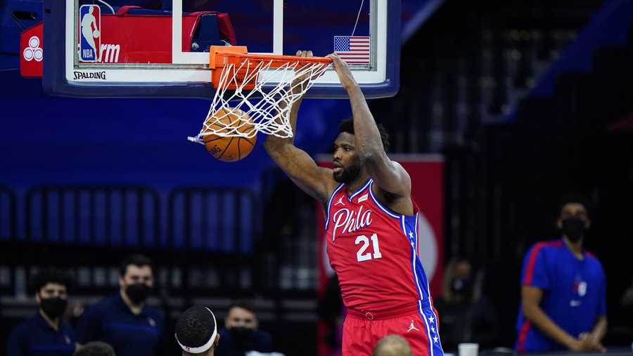 Philadelphia 76ers' Joel Embiid dunks the ball during the second half of an NBA basketball game against the Utah Jazz, Wednesday, March 3, 2021, in Philadelphia.