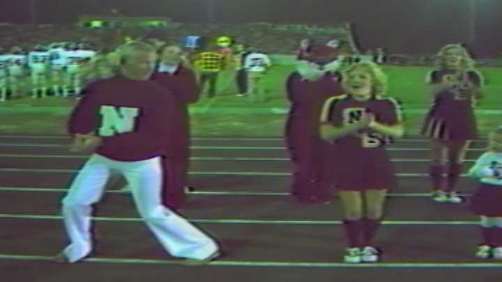 Johnny Carson joins Norfolk High School's cheer squad at 1981 game