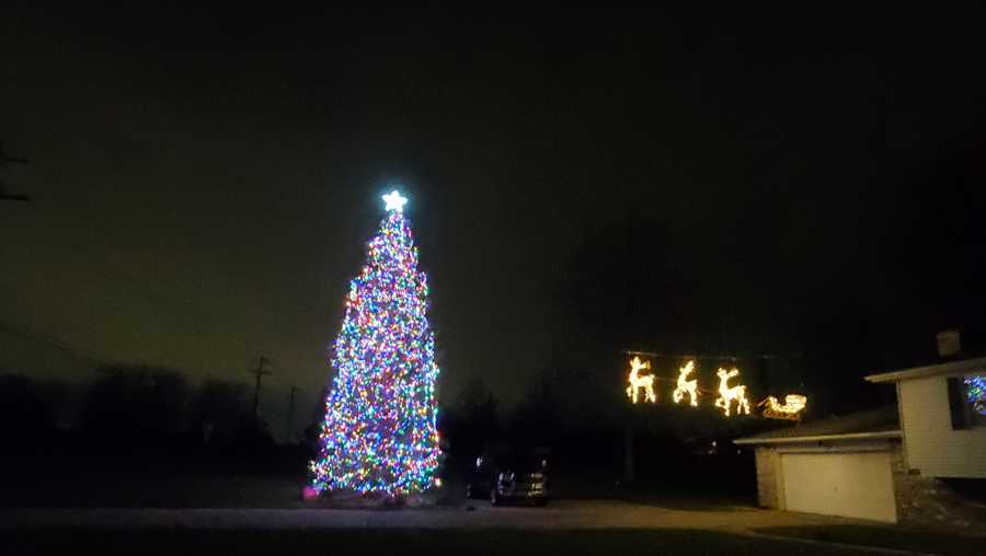 father and daughter create massive christmas tree in liberty township
