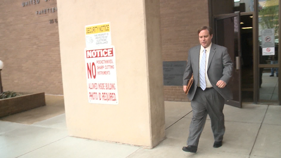 FILE image of Jon Woods exiting court during his trial