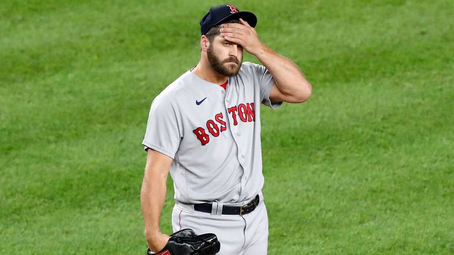 Boston Red Sox relief pitcher Josh Osich reacts after allowing a solo home run to New York Yankees Luke Voit, Voit's second of the night, during the fifth inning of a baseball game against the New York Yankees, Monday, Aug. 17, 2020, in New York. (AP Photo/Kathy Willens)