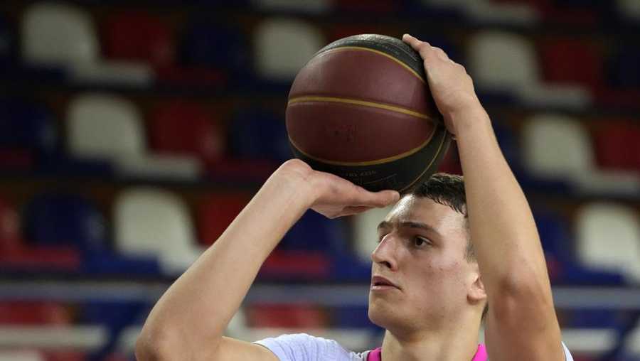 file - mega's nikola jovic tries to score during the aba league basketball match between fmp and mega in belgrade, serbia, saturday, jan. 29, 2022. jovic, of serbia, is one of the top international prospects heading into this year's nba draft. (ap photo/darko vojinovic, file)